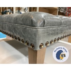 Glenmore Deep Buttoned Footstool with Border 91 x 91cm (36 x 36") Antique Matt Leather Storm - Full Vintage Stud Trim - 9ins Tapered Oak Leg 6152 Glenmore Deep Buttoned Footstool with Border 91 x 91cm (36 x 36") Antique Matt Leather Storm - Full Vintage Stud Trim - 9ins Tapered Oak Leg 6152