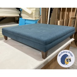 Fernworthy Shallow Buttoned Footstool with Border 122 x 122cm (48 x 48") Soft Weave Peacock - 5ins Tapered Oak Leg 6584