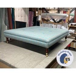 Fernworthy Shallow Buttoned Footstool with Border 122 x 122cm (48 x 48") Wool Check Powder - Single Piped Trim - 7ins Castor Mahogany Leg 6022 Fernworthy Shallow Buttoned Footstool with Border 122 x 122cm (48 x 48") Wool Check Powder - Single Piped Trim - 7ins Castor Mahogany Leg 6022