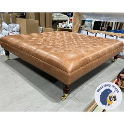 Glenmore Deep Buttoned Footstool with Border 122 x 122cm (48 x 48") Antique Matt Leather Bridle - Single Piped Trim - 7" Castor Mahogany Leg 5644