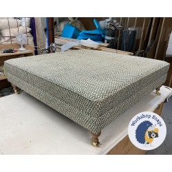 Design Change Fernworthy Shallow Buttoned Footstool with Border 122x122cm (48x48ins) in COM Namay Samay Lerio Deep Green - Additional Buttons + Pad Height Increase by 7cm - Border set at 11cm - 6ins Castor Oak Leg 9488 Design Change Fernworthy Shallow Buttoned Footstool with Border 122x122cm (48x48ins) in COM Namay Samay Lerio Deep Green - Additional Buttons + Pad Height Increase by 7cm - Border set at 11cm - 6ins Castor Oak Leg 9488